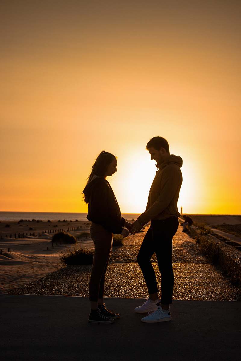 holding hands silhouette of couple human